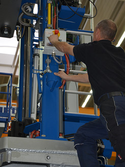 Kurtz Ersa Technician assembling a low-pressure casting engine
