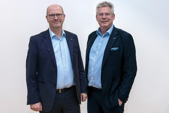 New and old CEO: Ralph Knecht (left) with Rainer Kurtz